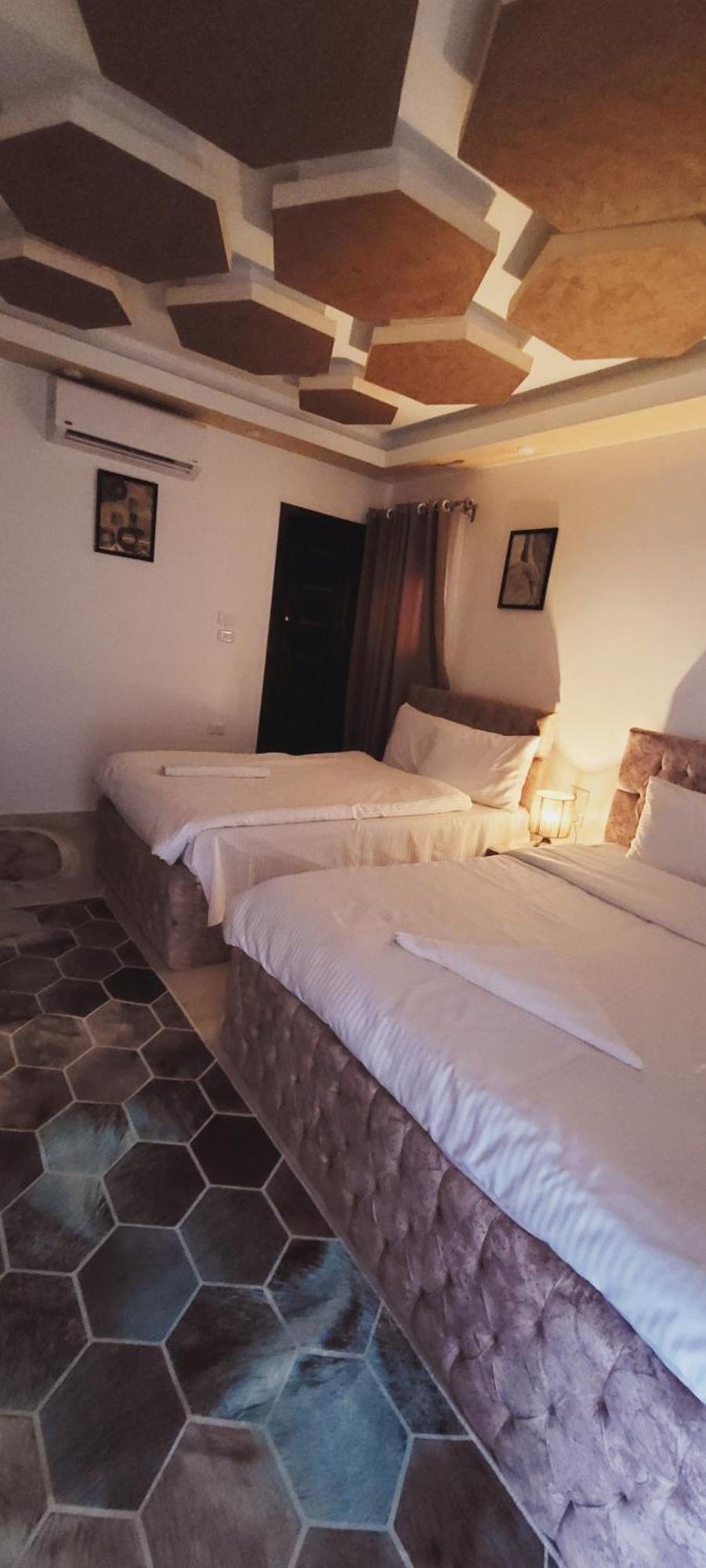 Alaa Eldein Pyramids Lights Hotel Kafrat al Jabal Quarto foto